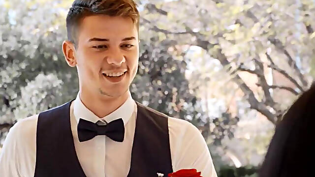 A guy in a tuxedo and a bow tie fucks a mature Asian in tight pussy
