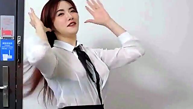 Amateur redhead Jacqueline with glasses masturbates