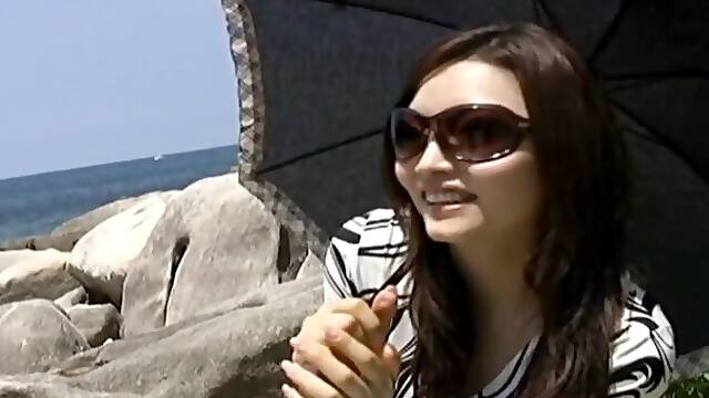 Outdoors video of sexy Japanese Eiko posing and getting penetrated